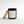 Archive No. 4 Presence candle by Five Thirty PM Candle Co® in a black glass jar with a wooden lid and brandy, sandalwood, and leather fragrance notes.