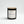 Archive No. 5 Devotion candle by Five Thirty PM Candle Co® in a black glass jar with bergamot, jasmine, and sandalwood fragrance notes.