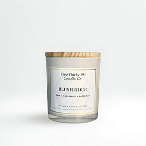 Blush Hour candle by Five Thirty PM Candle Co® in a white glass jar with wooden lid, featuring rose, grapefruit, and patchouli fragrance notes.