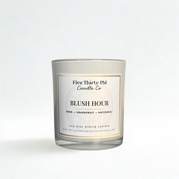 Open Blush Hour candle by Five Thirty PM Candle Co® in a white glass jar, featuring rose, grapefruit, and patchouli fragrance notes.
