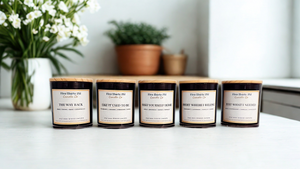Coming Home candle collection featuring The Way Back, Like It Used To Be, Make Yourself Home, Right Where I Belong, and Just What I Needed candles in black glass jars with bamboo lids by Five Thirty PM Candle Co®.